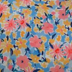 ORANGE/GOLD FLORAL ON PALE BLUE