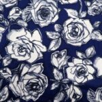 WHITE AND BLACK ROSES ON NAVY BACKGROUND