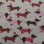 FESTIVE DACHSHUNDS ON CREAM