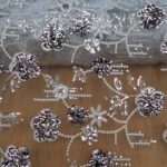 EMB GOLD SEQUIN ON TULLE