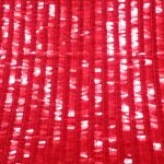 RED FRINGE ON RED TULLE 132CMS