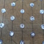 SILVER SAMLL ROSES ON BLACK TULLE 137 CMS