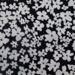 WHITE FLOWERS ON BLACK