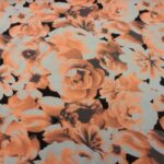 PEACH FLORAL ON IVORY JERSEY