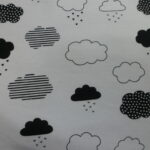 BLACK AND WHITE CLOUDS ON WHITE BACKGROUND