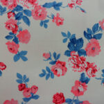 RED ROSE AND DENIM BLUE LEAVES ON CREAM BACKGORUND