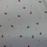TINY RED FLOWERS WITH DARK GREEN SPOT ON IVORY BACKGROUND