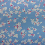 PINK AND CREAM ON CHAMBRAY BACKGROUND