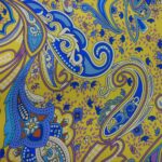 MULTI COLOURED ON LIGHT MUSTARD BACKGROUND