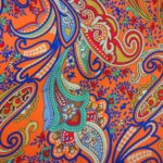 MULTI COLOURED ON TANGERINE BACKGROUND