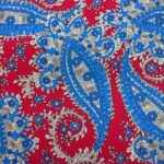 LIGHT BLUE CREAM ON RED BACKGROUND