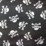 WHITE SKULLS ON BLACK BACKGROUND