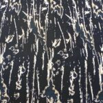 WHITE DESIGN ON BLACK BACKGROUND